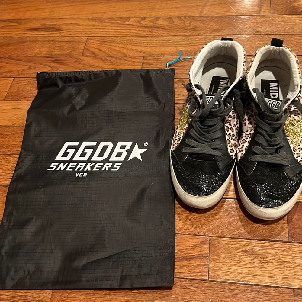 Lovingly worn leopard print, gold and black Golden Goose mid star